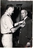 DAD RECEVING BARS AND MEDALS 